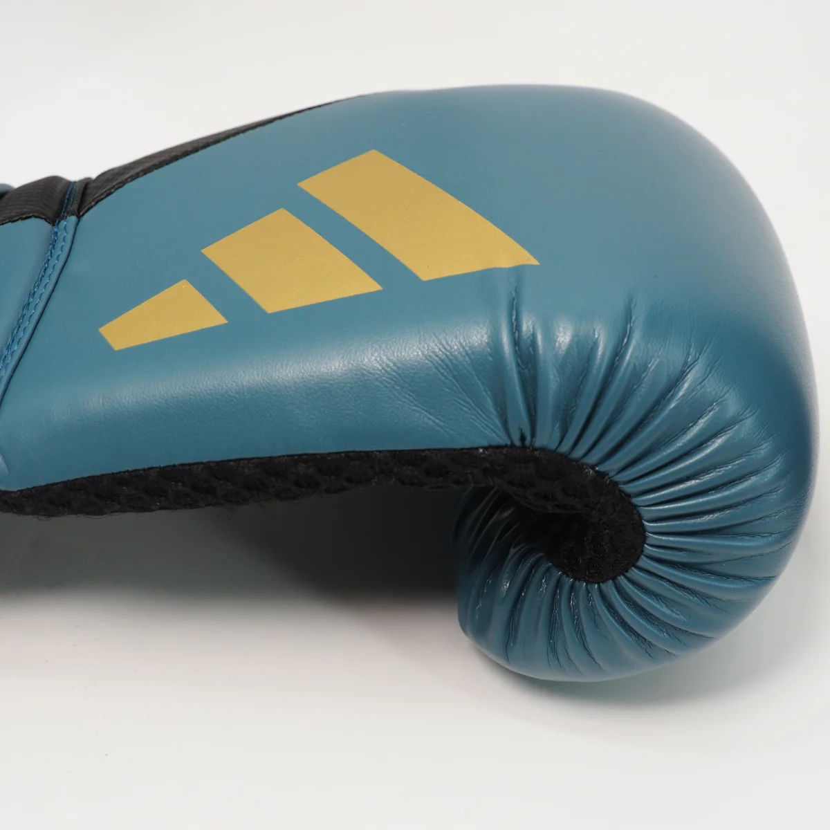 Boxhandschuh, Leder, Türkisblau, Orangene Logo, offene Handfläche Design